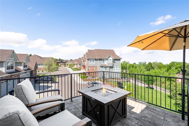 8357 W 68th Ln, Arvada, CO 80004 - deck featuring a residential view and an outdoor fire pit