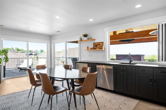 8357 W 68th Ln, Arvada, CO 80004 - dining area featuring light wood-style flooring and recessed lighting