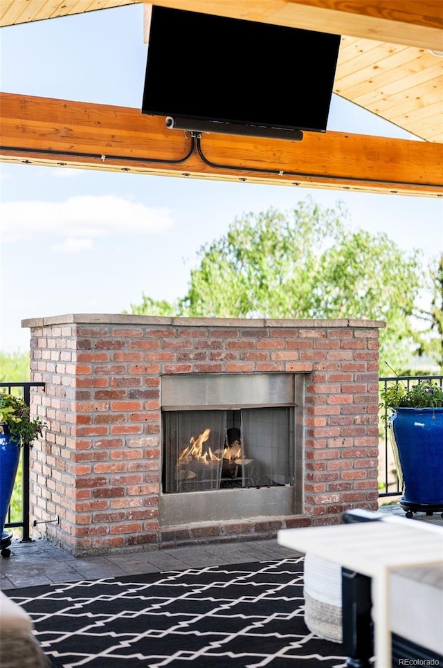 8357 W 68th Ln, Arvada, CO 80004 - detailed view of a warm lit fireplace