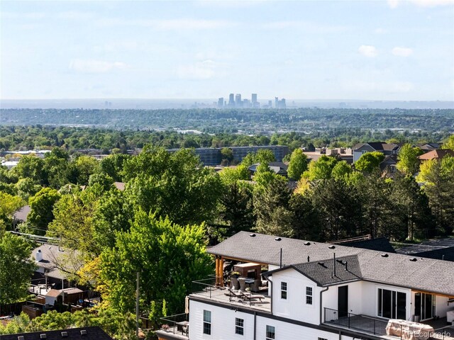 8357 W 68th Ln, Arvada, CO 80004 - drone / aerial view of a tree filled landscape