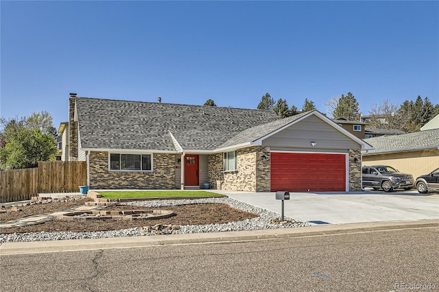 single story home featuring a garage, fence, roof with shingles, brick siding, and driveway