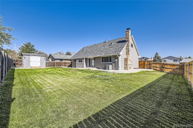 rear view of property featuring central AC, a shed, a chimney, a patio area, and an outdoor structure
