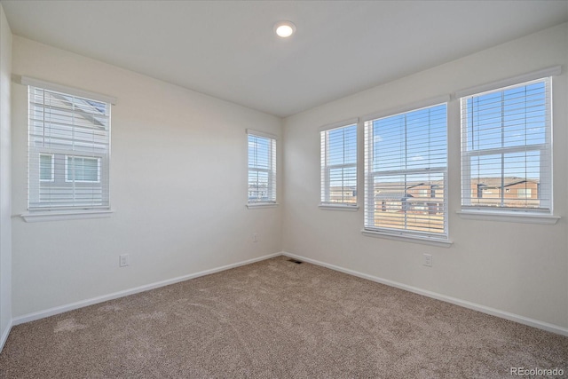 view of carpeted spare room