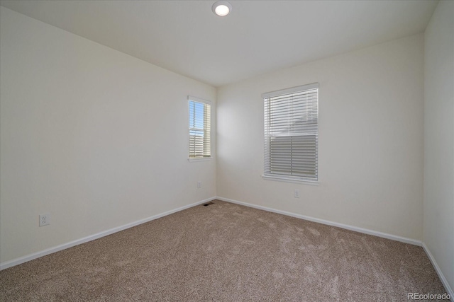 empty room featuring carpet