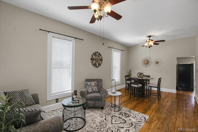 2415 Chase St, Edgewater, CO 80214 - living area with ceiling fan, hardwood / wood-style floors, and baseboards