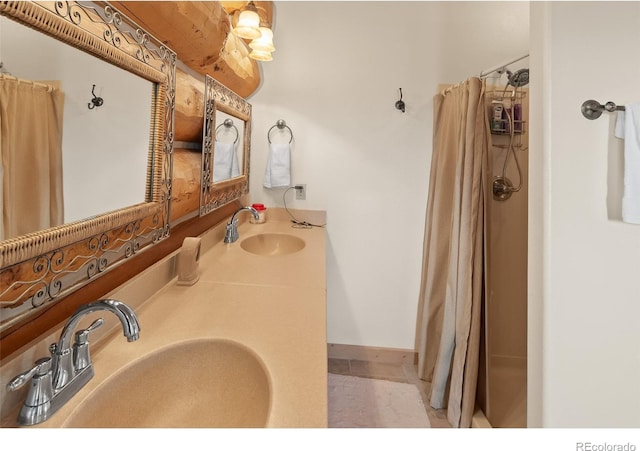 1000 N County Road 33, Como, CO 80432 - full bathroom featuring curtained shower and double vanity