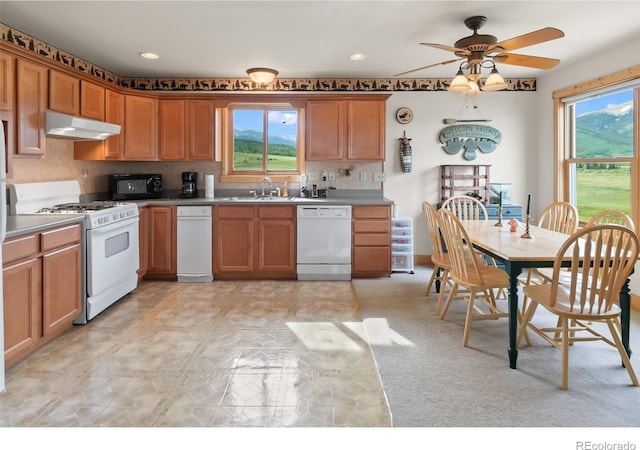 1000 N County Road 33, Como, CO 80432 - kitchen featuring white appliances, under cabinet range hood, healthy amount of natural light, ceiling fan, and recessed lighting