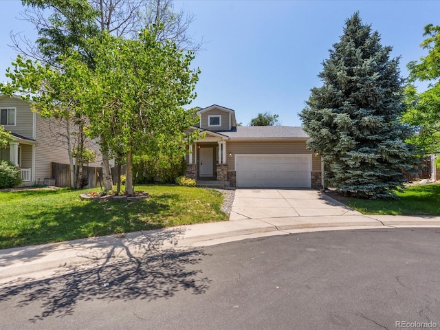 12555 Eastlake Dr, Thornton, CO 80241 - obstructed view of property featuring a garage, concrete driveway, and stone siding