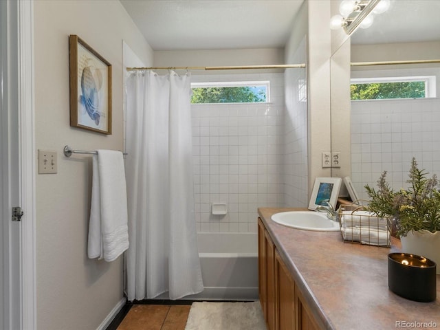 12555 Eastlake Dr, Thornton, CO 80241 - bathroom featuring shower / bath combination with curtain, vanity, and tile patterned floors