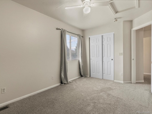 12555 Eastlake Dr, Thornton, CO 80241 - unfurnished bedroom with carpet, a closet, and a ceiling fan