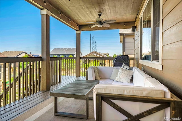 22891 E Union Cir, Aurora, CO 80015 - view of wooden balcony with ceiling fan, an outdoor hangout area, and a deck