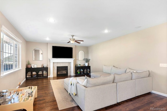 22891 E Union Cir, Aurora, CO 80015 - living room with ceiling fan, a tile fireplace, dark wood-style flooring, and recessed lighting