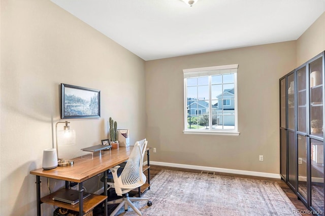 22891 E Union Cir, Aurora, CO 80015 - office space with baseboards and wood finished floors