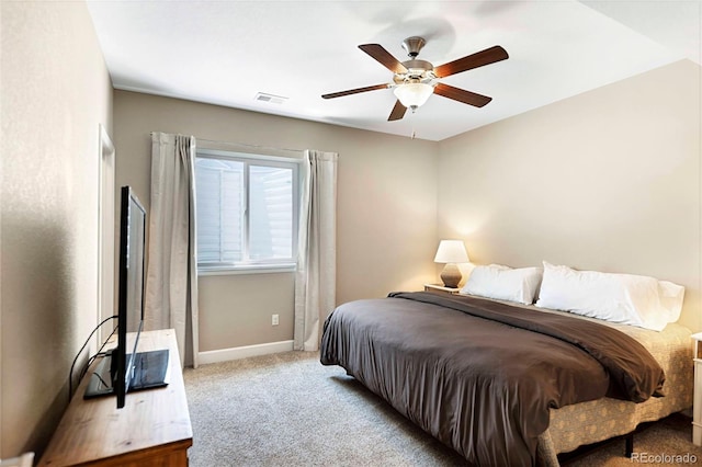 22891 E Union Cir, Aurora, CO 80015 - carpeted bedroom with baseboards and a ceiling fan