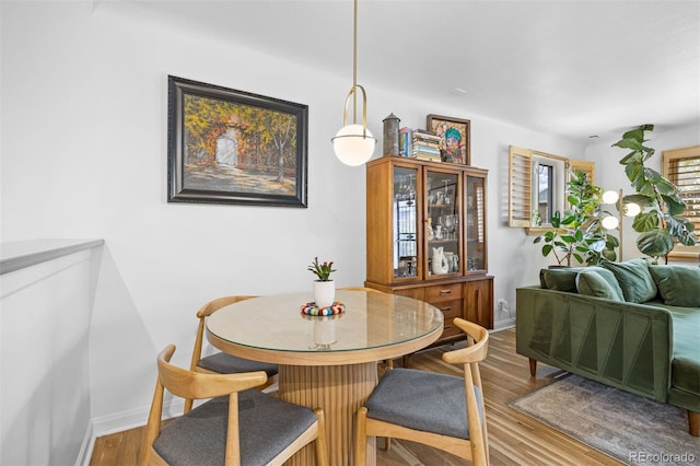 1335 Jasmine St, Denver, CO 80220 - dining room featuring wood finished floors and baseboards
