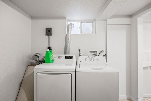 1335 Jasmine St, Denver, CO 80220 - laundry area with washing machine and dryer and a textured ceiling