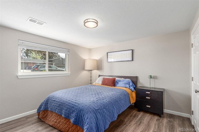 3841 W Quinn Pl, Denver, CO 80236 - bedroom featuring wood finished floors