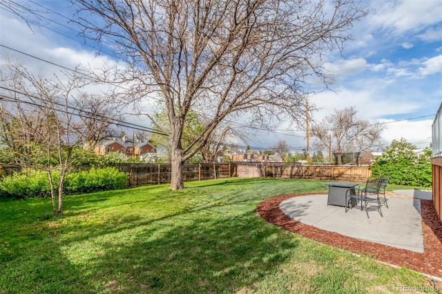 3841 W Quinn Pl, Denver, CO 80236 - fenced backyard featuring a patio area