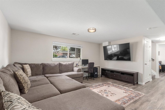 3841 W Quinn Pl, Denver, CO 80236 - living room featuring light wood-style flooring and a desk