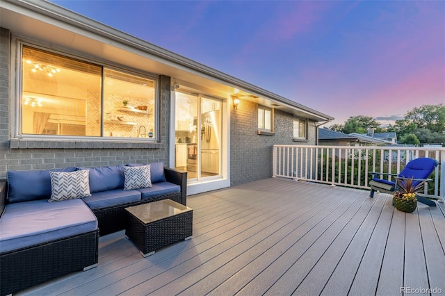 3841 W Quinn Pl, Denver, CO 80236 - deck at dusk featuring an outdoor hangout area