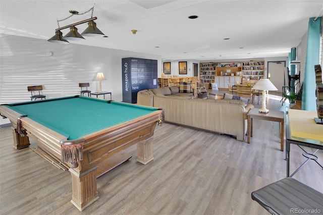 recreation room featuring wood finished floors and billiards