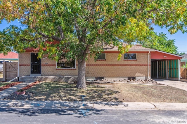 view of front of property with a carport