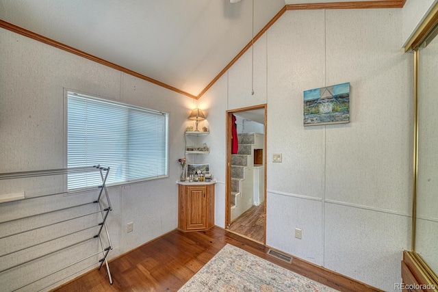 10795 County Road 197a Unit 184, Nathrop, CO 81236 - dining area with crown molding, vaulted ceiling, and wood finished floors