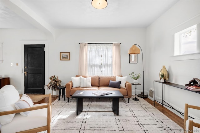 5103 Quitman St, Denver, CO 80212 - living room with light wood-style flooring and a baseboard radiator