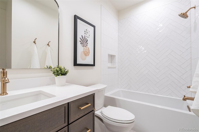 bathroom featuring shower / washtub combination, vanity, and toilet