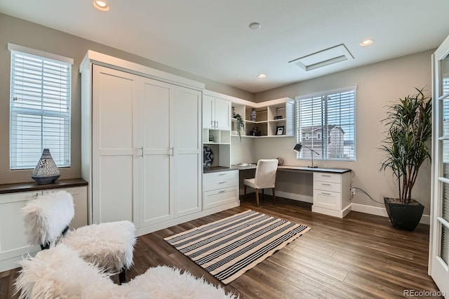 38 Morgan Cir, Erie, CO 80516 - office with built in desk, dark wood-style floors, recessed lighting, baseboards, and attic access