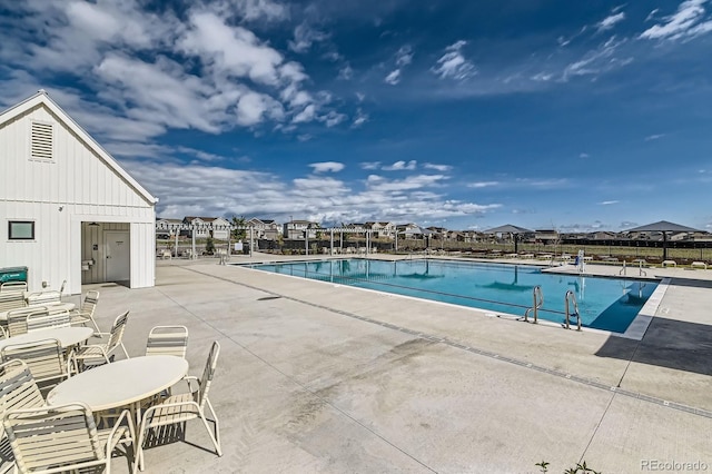 38 Morgan Cir, Erie, CO 80516 - community pool featuring a patio
