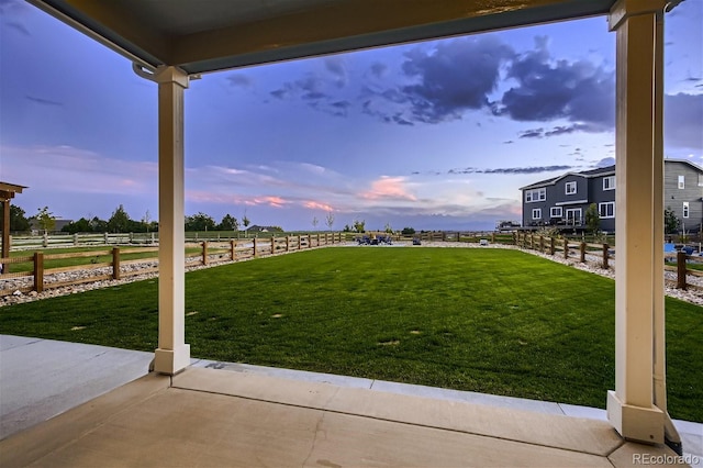 38 Morgan Cir, Erie, CO 80516 - yard at dusk featuring a patio area