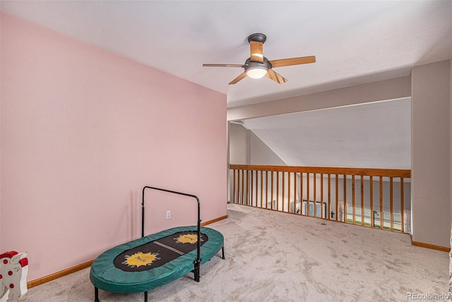 9640 Moss Rose Cir, Highlands Ranch, CO 80129 - rec room with a ceiling fan, carpet floors, and vaulted ceiling