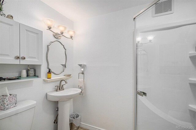 9640 Moss Rose Cir, Highlands Ranch, CO 80129 - bathroom featuring a shower stall