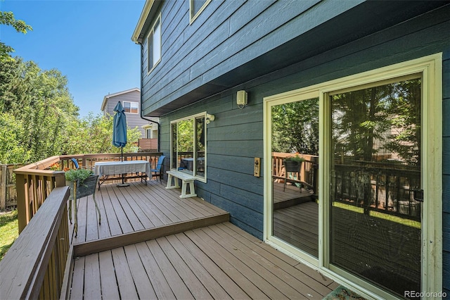 9640 Moss Rose Cir, Highlands Ranch, CO 80129 - deck featuring outdoor dining area