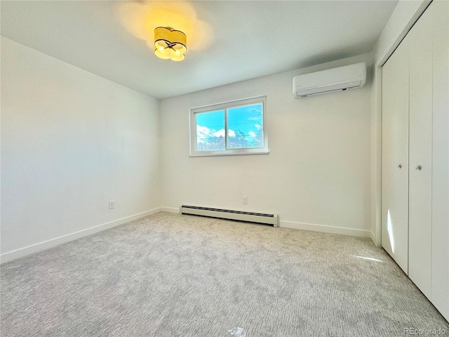 unfurnished bedroom with a baseboard heating unit, a wall mounted air conditioner, light colored carpet, and a closet