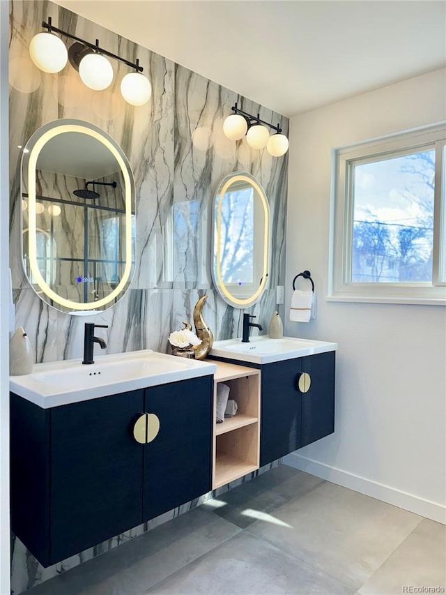 bathroom with walk in shower and vanity