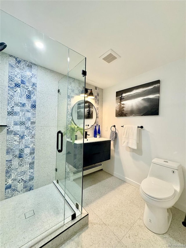 bathroom with vanity, toilet, and walk in shower