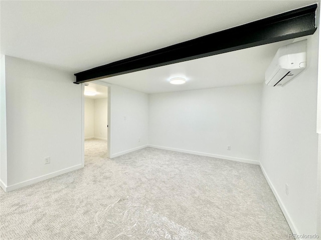 basement with light colored carpet and a wall mounted AC