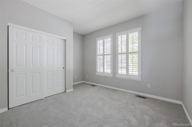 3126 Aspen Creek Dr, Highlands Ranch, CO 80129 - unfurnished bedroom featuring carpet, baseboards, and a closet
