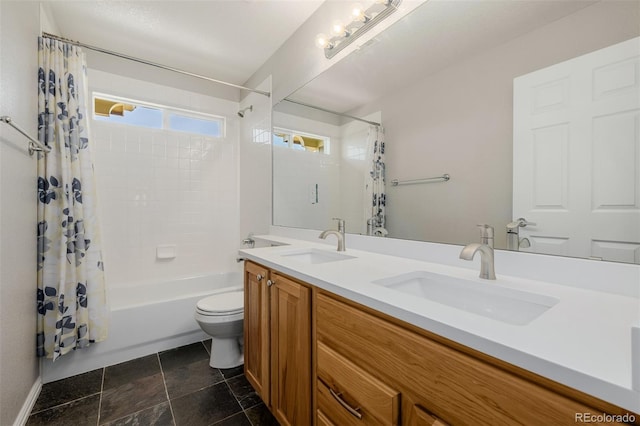 3126 Aspen Creek Dr, Highlands Ranch, CO 80129 - bathroom featuring shower / tub combo, toilet, and double vanity