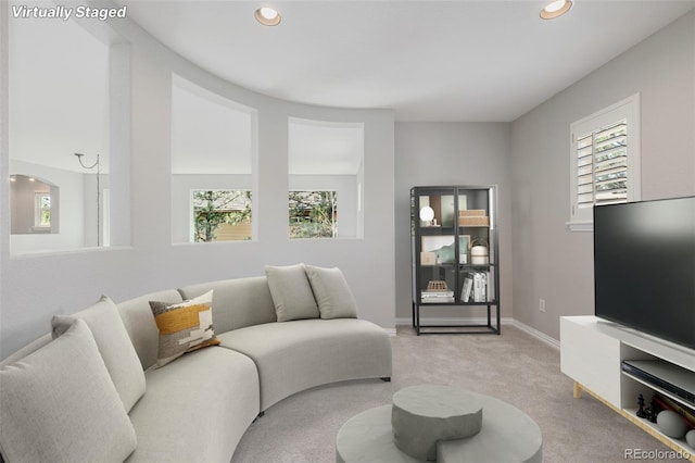 3126 Aspen Creek Dr, Highlands Ranch, CO 80129 - living room with healthy amount of natural light, light colored carpet, recessed lighting, and baseboards