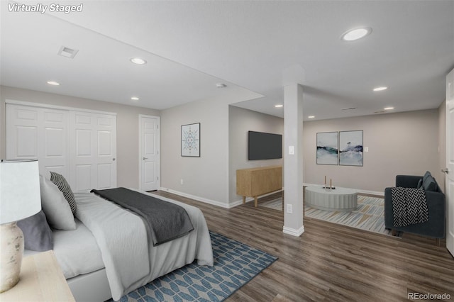 3126 Aspen Creek Dr, Highlands Ranch, CO 80129 - bedroom with wood finished floors, baseboards, recessed lighting, and a closet