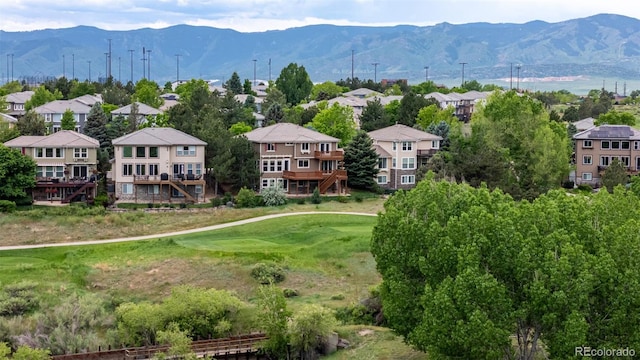 3126 Aspen Creek Dr, Highlands Ranch, CO 80129 - aerial view of a mountainous background and a golf club