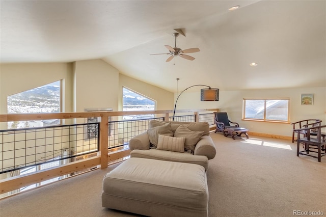 living area featuring carpet floors, lofted ceiling, recessed lighting, ceiling fan, and baseboards