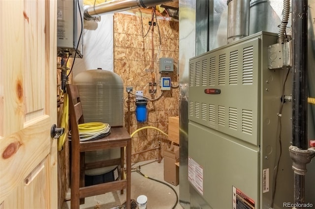 utilities featuring water heater and heating unit