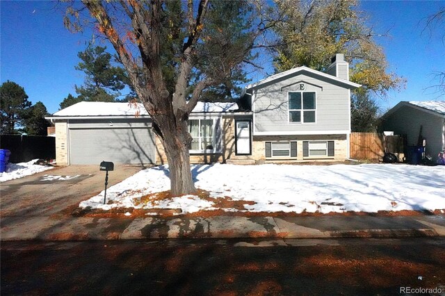 tri-level home featuring a garage