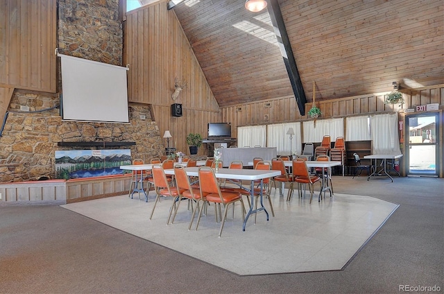 10795 County Road 197a Unit 6, Nathrop, CO 81236 - carpeted dining room with high vaulted ceiling, wood walls, and a stone fireplace