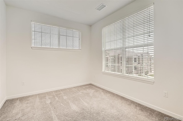 9185 Wilde Ln Unit 301, Parker, CO 80134 - spare room featuring carpet floors and baseboards