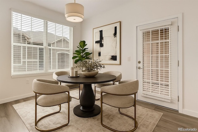 9185 Wilde Ln Unit 301, Parker, CO 80134 - dining area with wood finished floors and baseboards